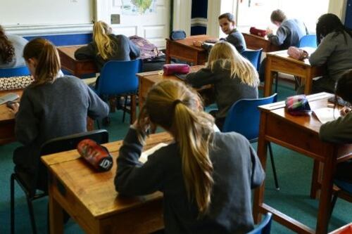 Taoiseach pledges schools will reopen after midterm