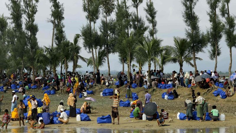 Displaced Rohingya refugees from Rakhine state in Myanmar rest near Ukhia, at the border between Bangladesh and Myanmar, as they flee violence on September 4th.  Photograph: K.M. Asadk/AFP/Getty Images