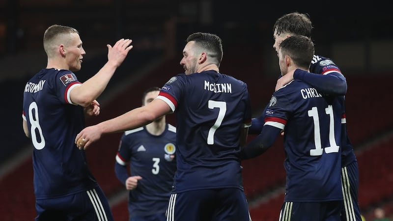 Scotland celebrate John McGinn’s late equaliser against Austria. Photograph: Jane Barlow/PA