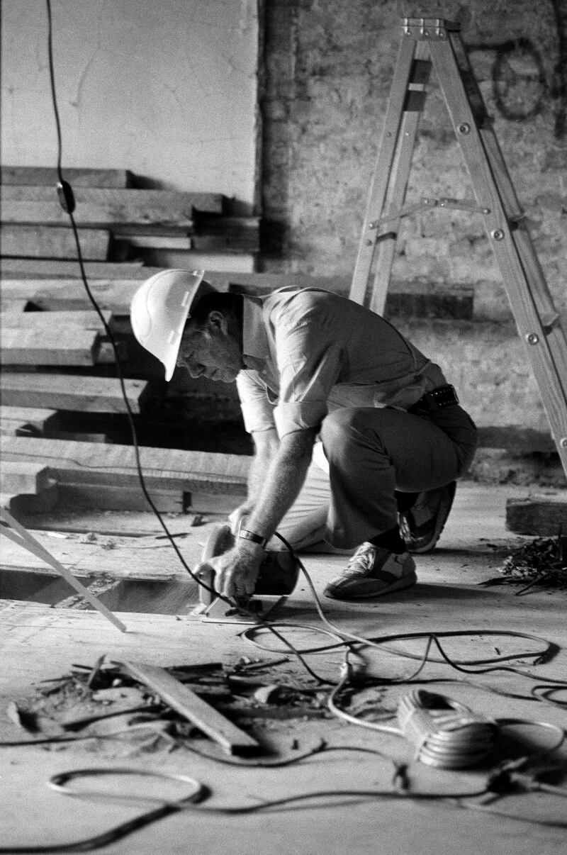 Former president Jimmy Carter, who traveled with a group from Georgia, does carpentry work at a building being renovated into apartments by Habitat for Humanity at 742 East Sixth Street in the Lower East Side neighborhood of Manhattan in September 1984. Photograph: Dith Pran/The New York Times
                      