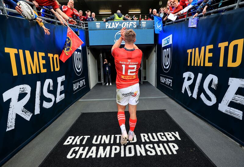 Munster’s Jack Crowley acknowledges the Munster supporters as he leaves the pitch following the win over Leinster. Photograph: Dan Sheridan/Inpho 