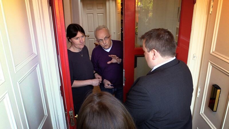 Ann Kean and Patrick Halpin at their home, Aberdeen Lodge, which is also a guesthouse in Sandymount, Dublin speaking to representatives of receivers appointed by Goldman Sachs who were attempting to take possession of the property. Photograph: Bryan O’Brien