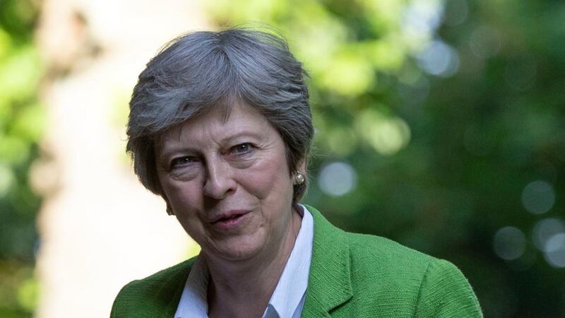 A London-Irish businessman and once-proud Leave voter is tight-lipped  and says he is “just bored with it”. Meaning? “There’s no end to it. The one I feel sorry for is Theresa May (above). Photograph: Steve Parsons/PA Wire