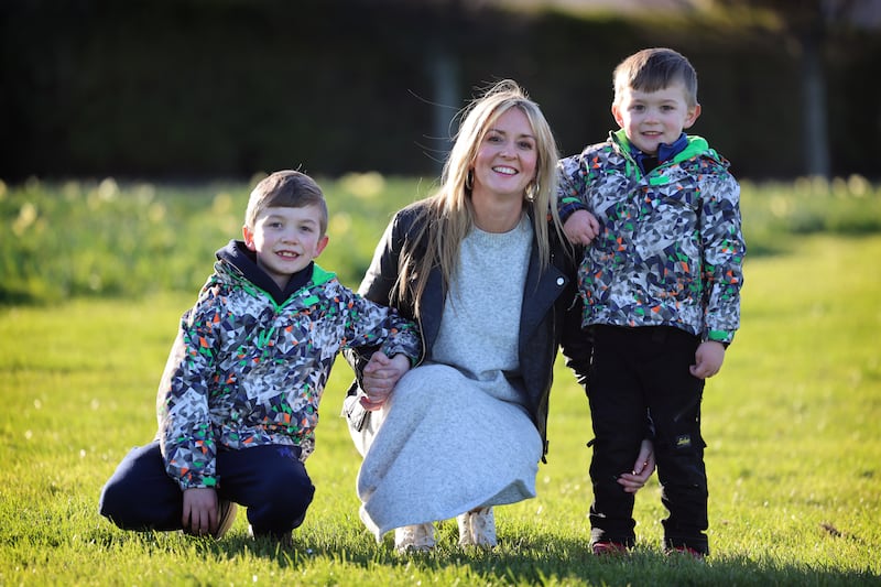 Bróna Coggins with her children Danny (seven) and Mason (five). Photograph: Dara Mac Dónaill