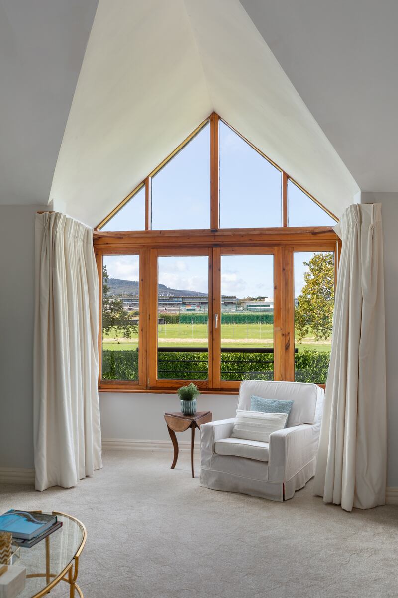 Living areas are full of light thanks to double height ceilings and lots of glazing. Photograph: Angela Mujica