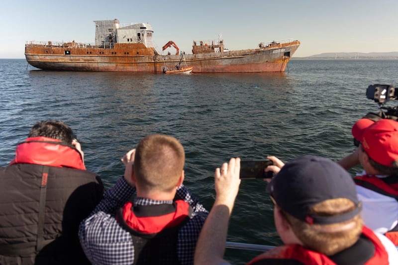 Members of the press watch the MV Shingle, a seized former smuggling ship, preparing to be sunk in Killala Bay to create Ireland’s first artificial reef. Photograph: Chris Maddaloni
