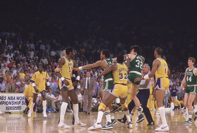 Players from the Los Angeles Lakers and Boston Celtics try to settle their differences on court in 1985. Photograph: Richard Mackson/Sports Illustrated via Getty Images