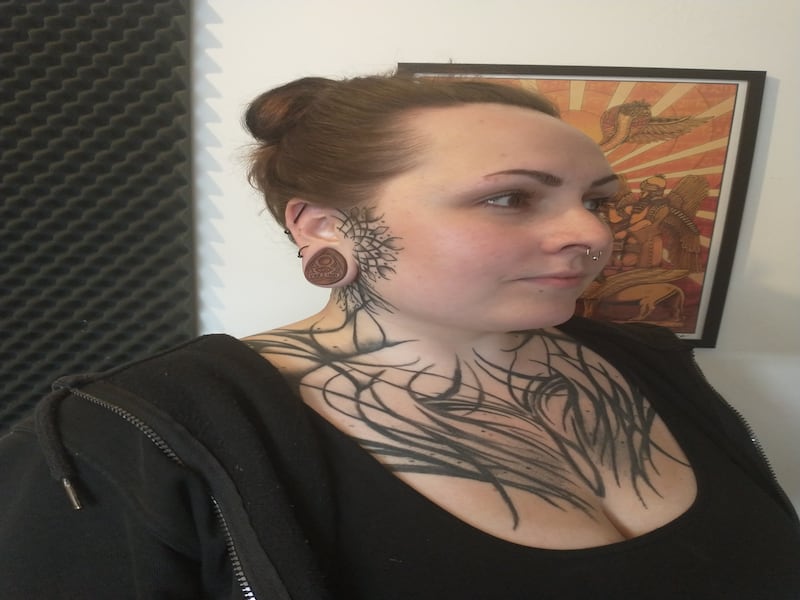 Tanya Louise Heaphy says she has no regrets about her prominent tattoos and has so far encountered no difficulty in finding work in the retail sector.