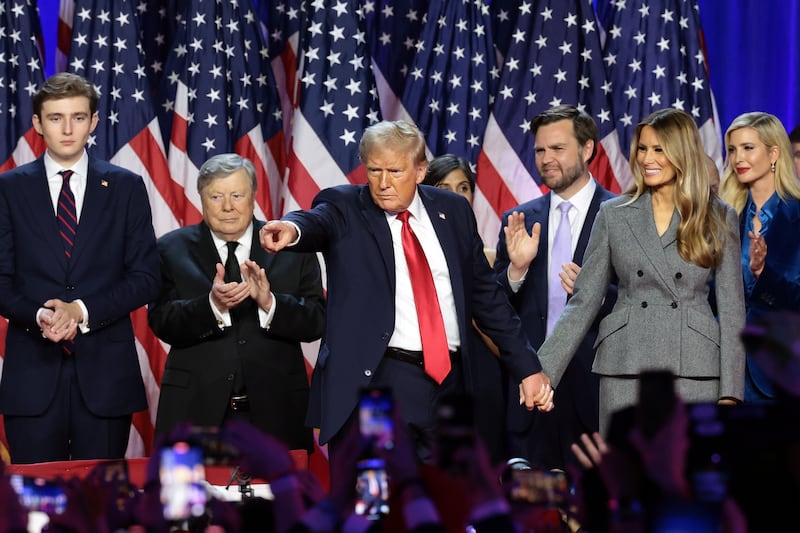 Donald Trump gestures on stage during an election night event at the Palm Beach Convention Center on November 6th, 2024, in West Palm Beach, Florida. 
Photograph: Win McNamee/Getty Images.