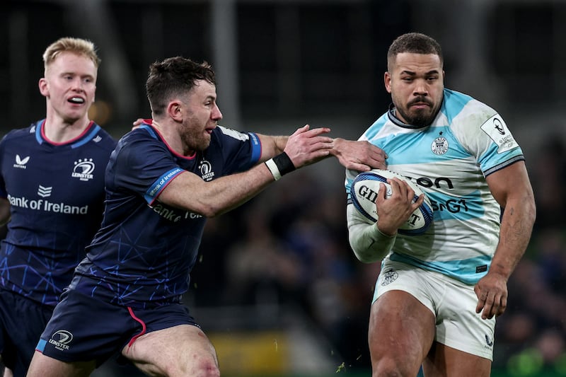 Leinster's Hugo Keenan tackles Bath's Ollie Lawrence. Photograph: Ben Brady/Inpho