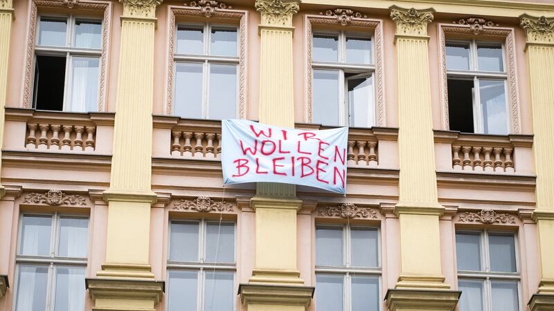 Berlin: A protest slogan on a building reads “We want to stay”. Photograph: iStock