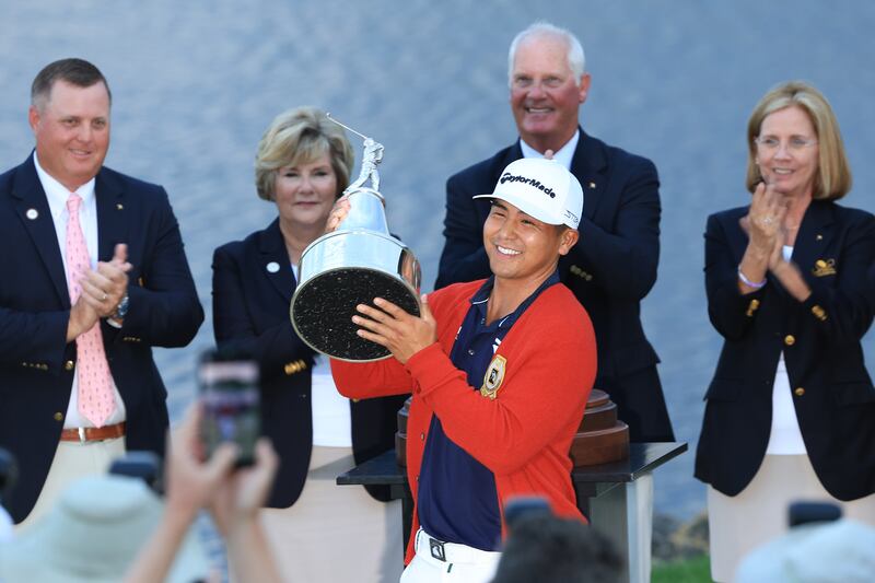 Kurt Kitayama celebrates with the trophy after winning the Arnold Palmer Invitational at  Bay Hill last year. Photograph: Sam Greenwood/Getty Images