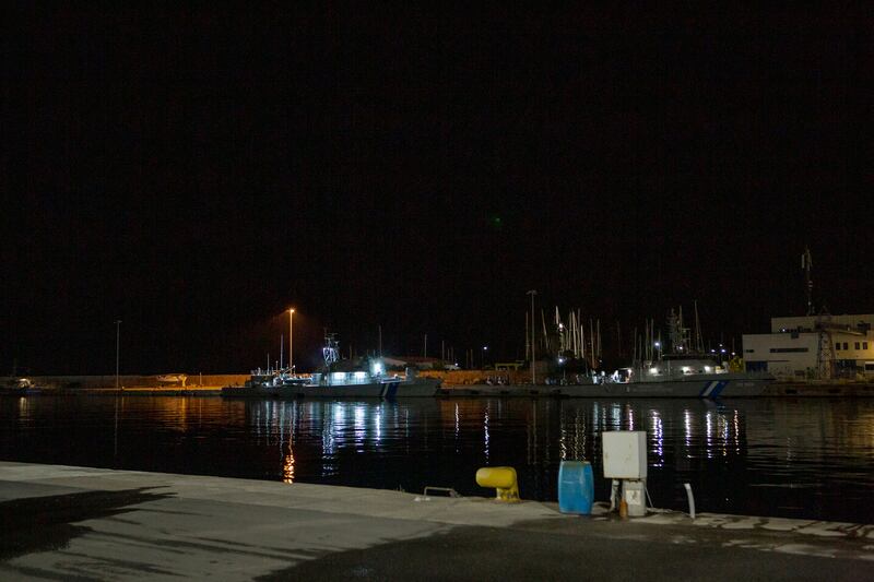 Greek coast guard ships that rescued the survivors of a migrant ship that drowned off the coast and transported the dead to the port, in Kalamata, Greece. Photograph: Eirini Vourloumis/The New York Times)
                      