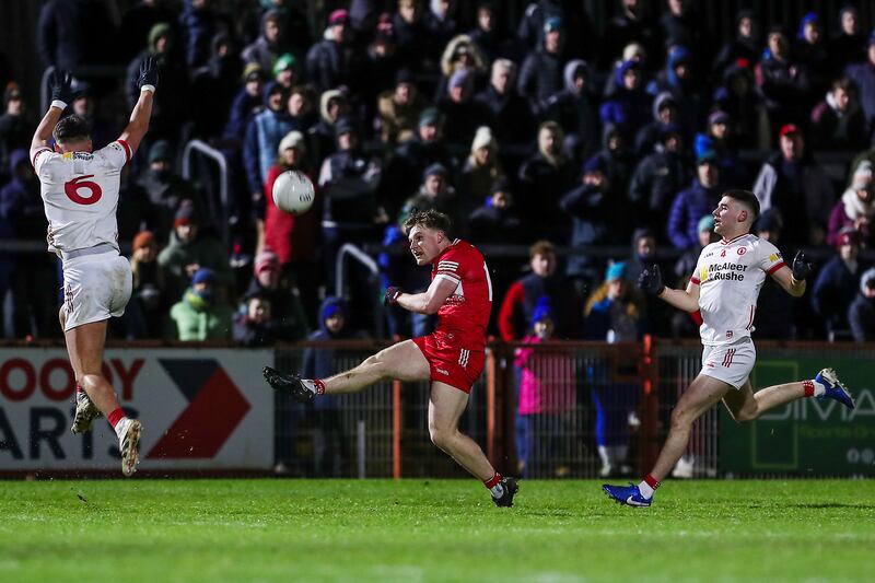 Derry’s Ethan Doherty with Tyrone's Michael McKernan and Niall Devlin during the National Football League Division 1 first round game at Healy Park on January 25th. Photograph: Lorcan Doherty/Inpho