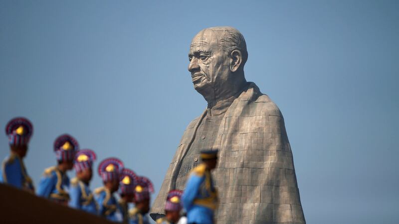 Police officers stand near the statue of Sardar Vallabhbhai Patel in India. Photograph: Amit Dave/Reuters