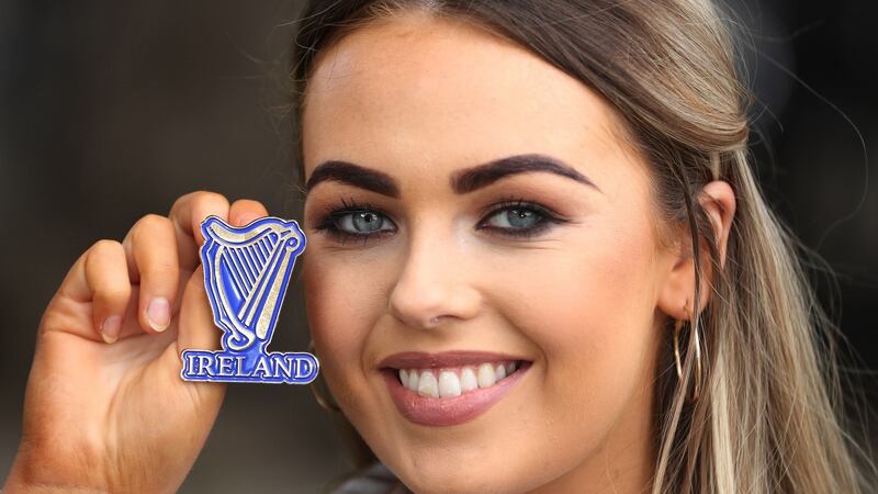 Ciara Daly, who will represent Ireland in the beauty therapy section in WorldSkills, holding up her official Ireland badge. Photograph: Maxwellphotography.ie