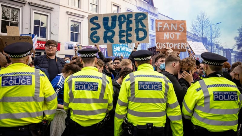 Chelsea fans protest outside Stamford Bridge ahead of their game with Brighton. Photograph: Rob Pinney/Getty