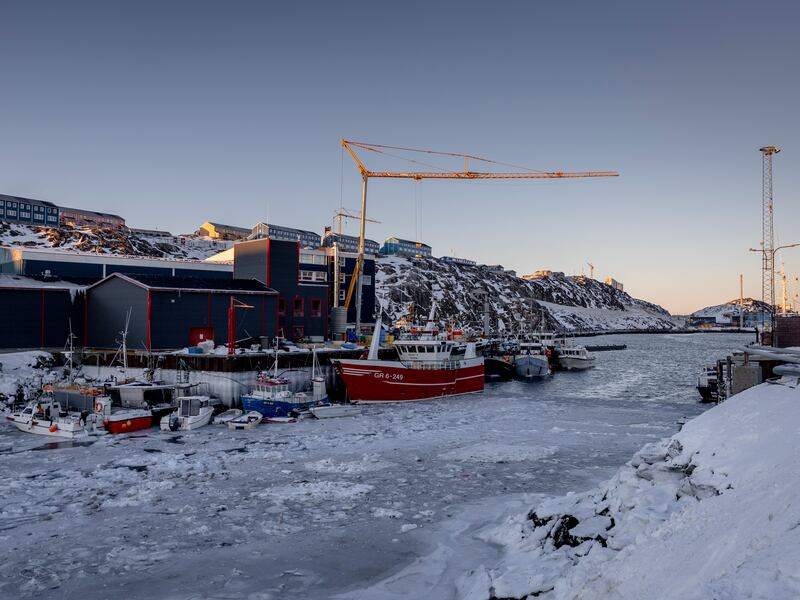 Fishing boats in a frozen harbour in Nuuk, Greenland. Photograph: Ivor Prickett/New York Times