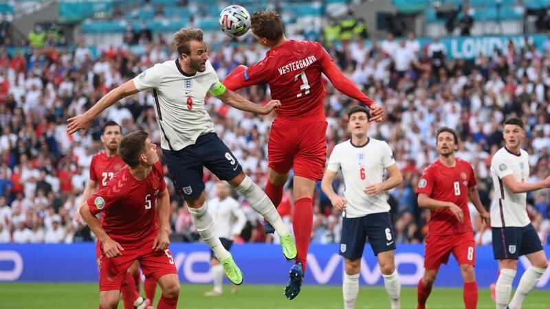 England’s  Harry Kane  vies for the ballwith Denmark’s Jannik Vestergaard during the Euro 2020 semi-final at Wembley. Photograph: Laurence Griffiths/AFP via Getty Images