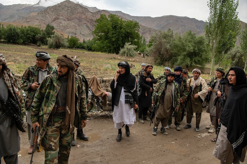 Mawlawi Mahdi Mujahid (centre in white) in Balkh Aab, Afghanistan, on June 21st. Photograph: Kiana Hayeri/New York Times