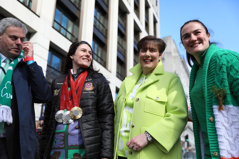 Grand marshals for the event including Paralympic cyclist Katie-George Dunlevy (second from left) and Olympic boxer, Kellie Harrington (right), take part in London's St Patrick's Day Festival on Sunday. Photograph: Alishia Abodunde/Getty Images