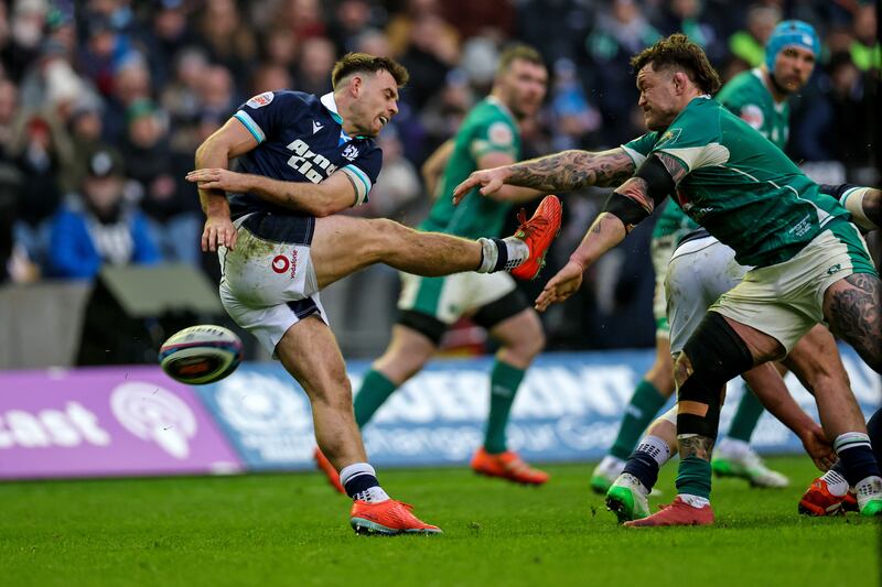 Scotland's Ben White and Ireland's Andrew Porter during Sunday's Six Nations game. Photograph: Billy Stickland/Inpho