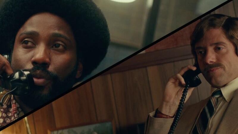 John David Washington and Topher Grace in BlacKkKlansman