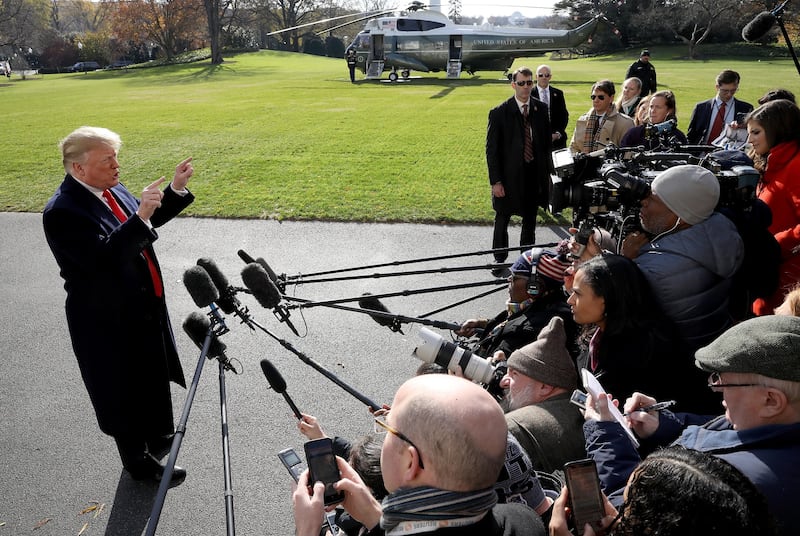 WASHINGTON, DC - NOVEMBER 29: U.S. President Donald Trump answers questions from the press while departing the White House November 29, 2018 in Washington, DC. Trump answered numerous questions regarding his former attorney Michael Cohen's recent court appearance and testimony before departing for the G-20 summit in Buenos Aires. (Photo by Win McNamee/Getty Images) *** BESTPIX ***