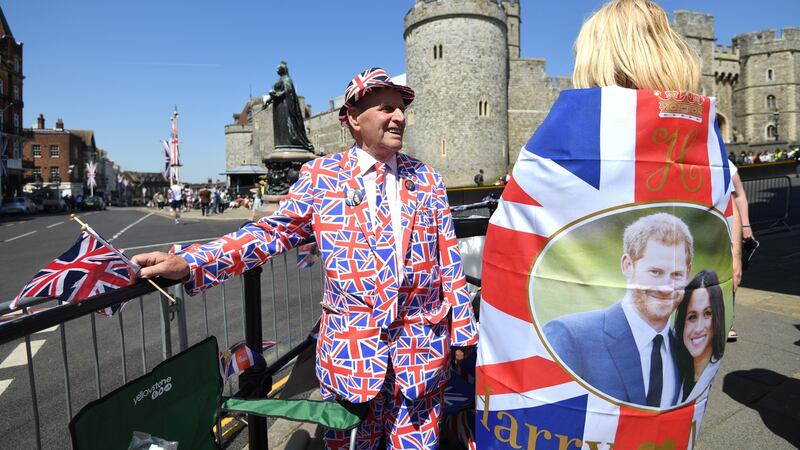 Royal supporters Maria Scott (R) Terry Hutt (L) pick their spots next to Windsor Castle ahead of the royal wedding. Photograph: Facundo Arrizabalaga/EPA