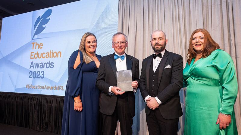 Willie Donnelly, judging co-ordinator, presents the Best Use of Educational Technology/ICT Initiative of the Year award to Academic Registry, University of Limerick team 