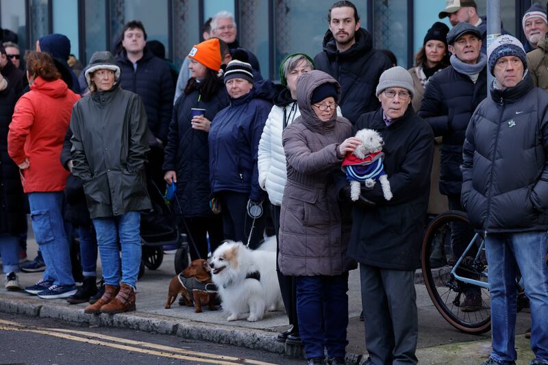 People watching the funeral procession leaving Shelbourne Park. 
Photograph: Alan Betson

