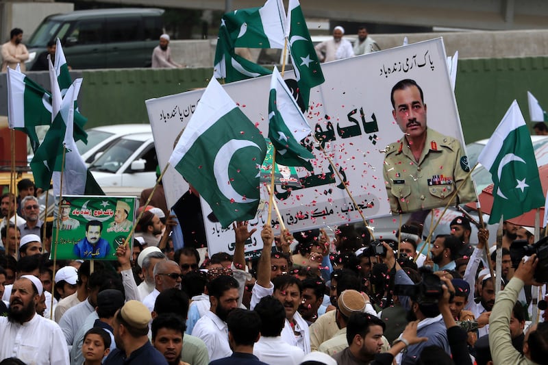 People attend a rally in support of the Pakistani army in Peshawar following the violent protests that erupted after the arrest of former prime minister Imran Khan. Photograph: Bilawal Arbab/EPA