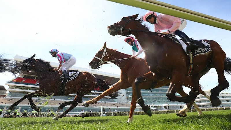 Hugh Bowman riding Anthony Van Dyck (right) in the Melbourne Cup. The Aidan O’Brien-trained horse was put down after fracturing a fetlock during the race. Photograph:  Robert Cianflone/Getty Images for the VRC