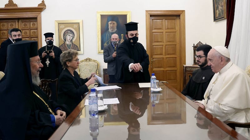 Pope Francis (right) visited Cypriot Orthodox Archbishop Chrysostomos (left)  to deepen relations between the two churches, which have been divided and often at odds since the 11th century. Photograph: Andreas Loucaides/PIO/AFP via Getty In this handout picture released by the Cypriot government's press office (PIO), Pope Francis (R) meets with Archbishop Chrysostomos II (L) of Cyprus at the Archbishopric of the Greek Orthodox Church in Nicosia, Europe's last divided capital, on December 3, 2021. - Pope Francis urged unity as Europe faces an influx of refugees and migrants, speaking on the divided Mediterranean island of Cyprus, a major destination for people fleeing war and poverty. (Photo by Andreas Loucaides / PIO / AFP) / RESTRICTED TO EDITORIAL USE - MANDATORY CREDIT "AFP PHOTO /PIO" - NO MARKETING - NO ADVERTISING CAMPAIGNS - DISTRIBUTED AS A SERVICE TO CLIENTS (Photo by ANDREAS LOUCAIDES/PIO/AFP via Getty Images)