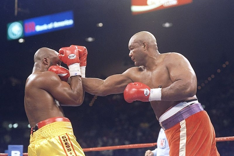 5 Nov 1994: George Foreman lands a straight right on Michael Moorer during a bout in Las Vegas. Foreman won the fight with a knockout in the tenth round. Photograph: Holly Stein/Allsport