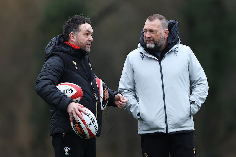 Matt Sherratt, interim head coach of Wales, speaking to coach Jonathan Humphreys during a training session at Vale Resort, Cardiff, on February 17th, 2025. Photograph: Dan Istitene/Getty Images