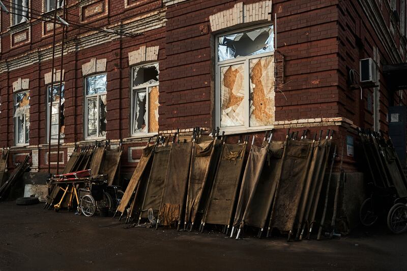 Stretchers outside a hospital in Bakhmut. Photograph: Libkos/AP