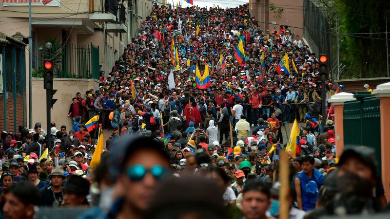 Protesters march against President Lenin Moreno’s decision to slash fuel subsidies, in Quito on Wednesday. Photograph: Rodrigo Buendia/AFP