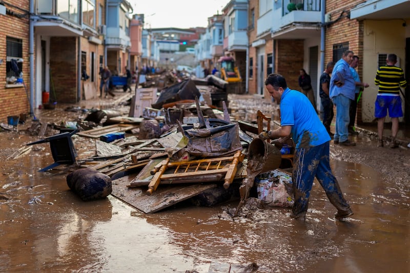 The clean-up after floods in Utiel. Photograph: Manu Fernandez/AP