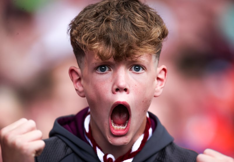 A young Galway fan celebrates a score in the All-Ireland final. Photograph: Tom Maher/Inpho