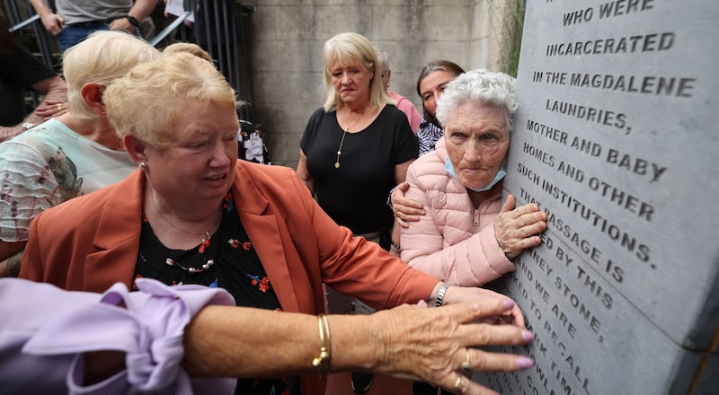 Survivors attend the unveiling of the Journey Stone at St Stephen's Green in Dublin in July 2022. The monument acknowledges the passage of those who were incarcerated in Magdalene Laundries, Mother and Baby Homes and other residential institutions in Ireland. Maureen Sullivan is at centre in background. Photograph: Nick Bradshaw 