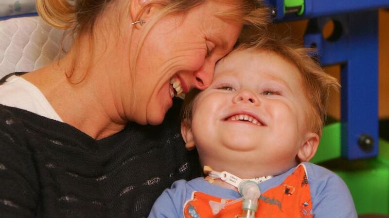 File photograph of Matthew McGrath and his mother Cathy in St Patrick’s ICU ward of Our Lady’s Hospital for Sick Children. Photograph: Bryan O’Brien/The Irish Times