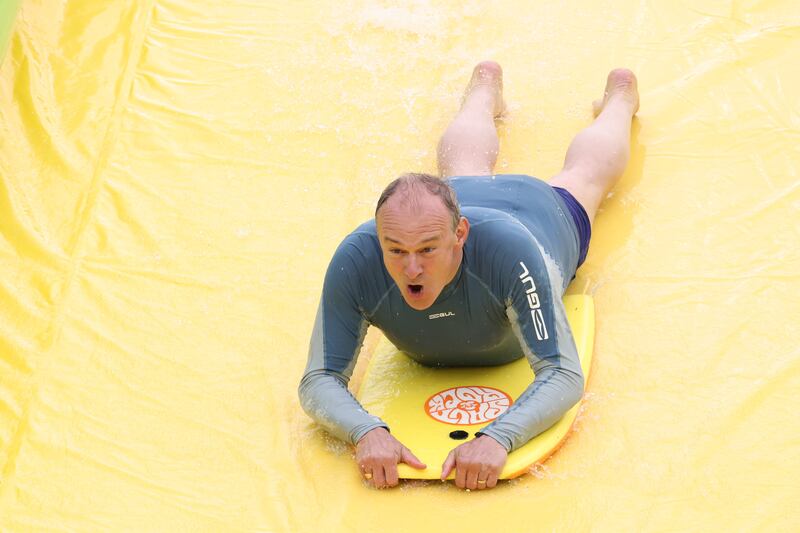 Head-first on the Ultimate Slip 'n' Slide at Eastcote Farm  in Beckington. Photograph: Hollie Adams/Bloomberg 