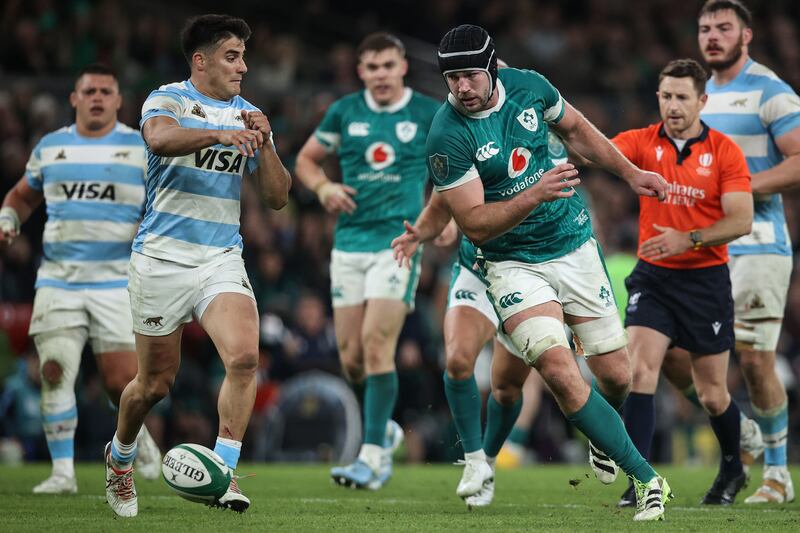 Argentina's Tomas Albornoz and Ireland's Caelan Doris chase a loose ball. Photograph: Ben Brady/Inpho