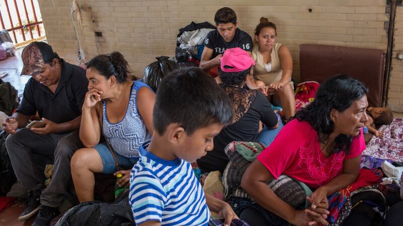 Migrants rest at a temporary camp in Matías Romero. Photograph: Brett Gundlock/The New York Times