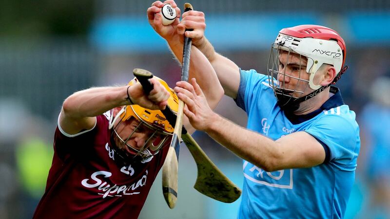 Dublin’s Paddy Smyth challenges  David Glennon of Galway during the Leinster SHC round-robin game at Parnell Park. Photograph: Ryan Byrne/Inpho