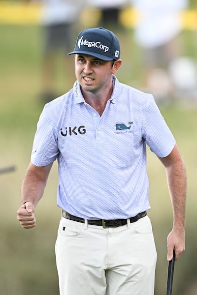 J.T. Poston celebrates after his putt on the 18th green during the final round of the Shriners Children's Open 2024 at TPC Summerlin in Las Vegas, Nevada. Photograph: Orlando Ramirez/Getty Images