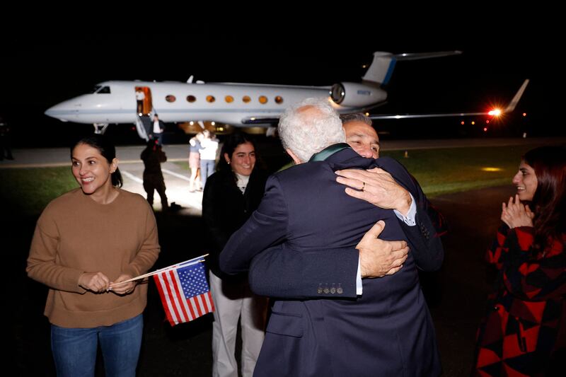 Freed US nationals Emad Shargi  greets a family member as he and four others, who were released in a prisoner swap deal between US and Iran, disembark from an airplane at Davison Army Airfield at Fort Belvoir, Virginia, in September. Photograph: Jonathan Ernst/AFP via Getty Images