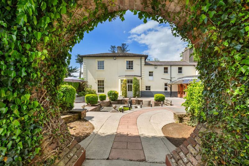 The moongate connecting the courtyard to a walled garden