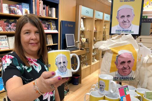 Papal paraphernalia ‘selling like hotcakes’ as retailers cash in on Pope’s visit